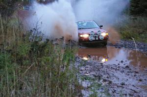 Rob Stroik/ Ross Wegge Nissan Sentra SE-R hits the final big puddle at the end of Gratiot Lake 2, SS14, at speed.