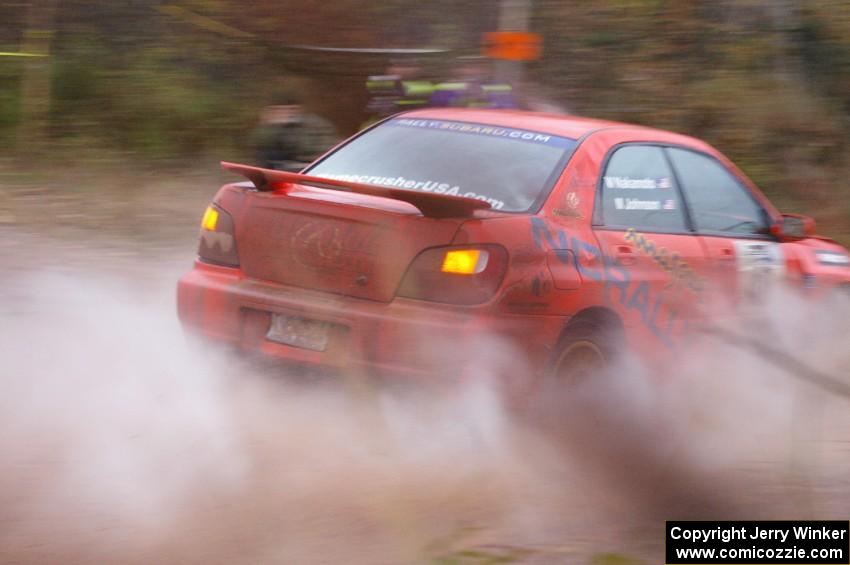 Matthew Johnson / Wendy Nakamoto Subaru WRX exits the final big puddle at the end of Gratiot Lake 2, SS14, at speed.