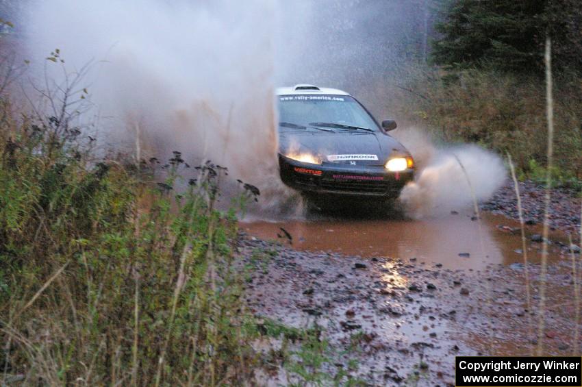Matt Johnston / Alex Kihurani Honda Civic hits the final big puddle at the end of Gratiot Lake 2, SS14, at speed.