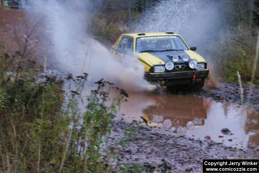 Eric Mozer / Jay Efting	Alfa Romeo Milano hits the final big puddle at the end of Gratiot Lake 2, SS14, at speed.