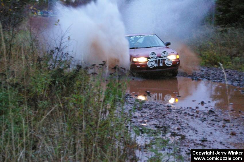 Rob Stroik/ Ross Wegge Nissan Sentra SE-R hits the final big puddle at the end of Gratiot Lake 2, SS14, at speed.