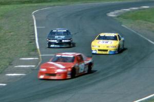 Randy MacDonald's Chevy Lumina, Mike Miller's Chevy Lumina and Alec Pinsonneault's Chevy Lumina