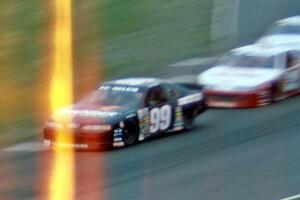 Dick Trickle's Ford Thunderbird and Johnny Benson, Jr.'s Chevy Lumina