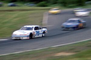 John Cadman's Olds Cutlass Supreme and Bob Senneker's Ford Thunderbird