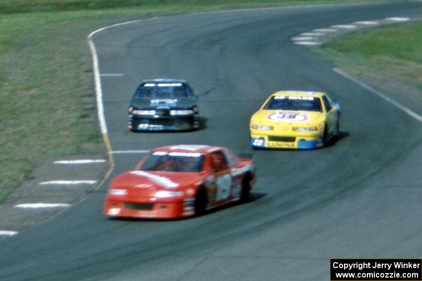 Randy MacDonald's Chevy Lumina, Mike Miller's Chevy Lumina and Alec Pinsonneault's Chevy Lumina