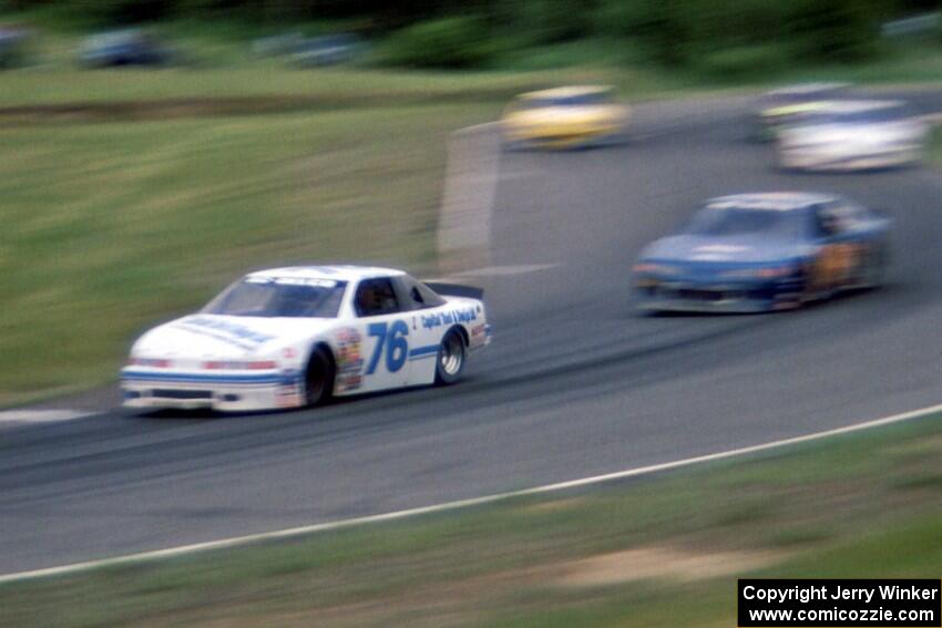 John Cadman's Olds Cutlass Supreme and Bob Senneker's Ford Thunderbird