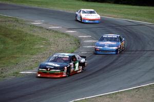 Jay Sauter's Chevy Lumina, Bob Senneker's Ford Thunderbird and Ken Schrader's Chevy Lumina