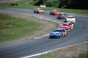 The front-runners stream through turn 8.