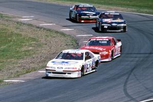 Butch Miller's Ford Thunderbird, Brad Loney's Chevy Lumina, Dick Trickle's Ford Thunderbird and Jay Sauter's Chevy Lumina