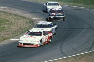 John Freeman's Chevy Lumina, Tom Harrington's Olds Cutlass, Dick Trickle's Ford Thunderbird and Scott Hansen's Chevy Lumina