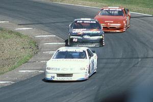 Leighton Reese's Chevy Lumina, Dick Trickle's Ford Thunderbird and Mike Miller's Pontiac Grand Prix