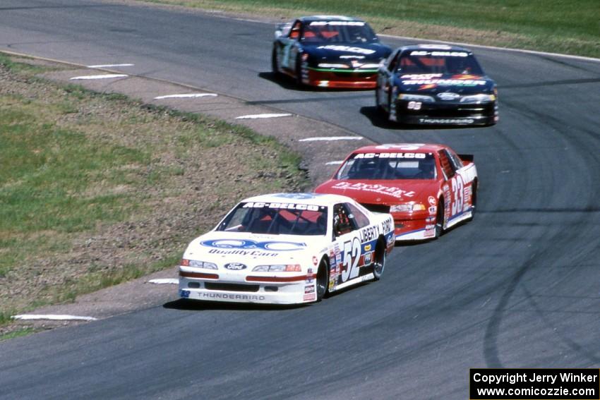 Butch Miller's Ford Thunderbird, Brad Loney's Chevy Lumina, Dick Trickle's Ford Thunderbird and Jay Sauter's Chevy Lumina