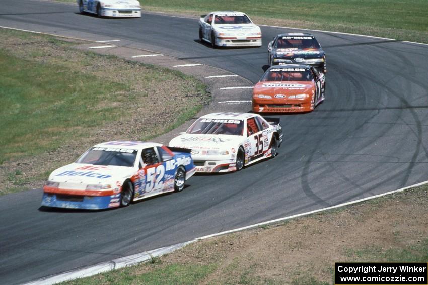 Ken Schrader's Chevy Lumina, Chuck Hemmingson's Chevy Lumina, Gary St. Amant's Ford Thunderbird, etc