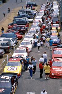 The field lines up on the false grid behind the start tower before the start of the race.