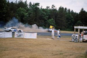 Bob Senneker pops an oil line and catches the engine of his Ford Thunderbird on fire