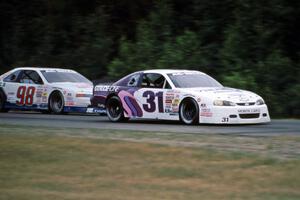 Rick Miller's Chevy Monte Carlo and Kent Stauffer's Ford Thunderbird