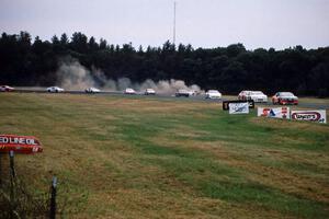 Rick Miller's Chevy Monte Carlo goes into the grass at turn 3