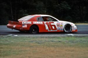 John Freeman's Chevy Monte Carlo limps through turn 3 with a flat tire