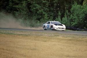 Leighton Reese's Pontiac Grand Prix uses all of the track coming out of turn 2