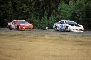 Leighton Reese's Pontiac Grand Prix ahead of Mike Miller's Pontiac Grand Prix