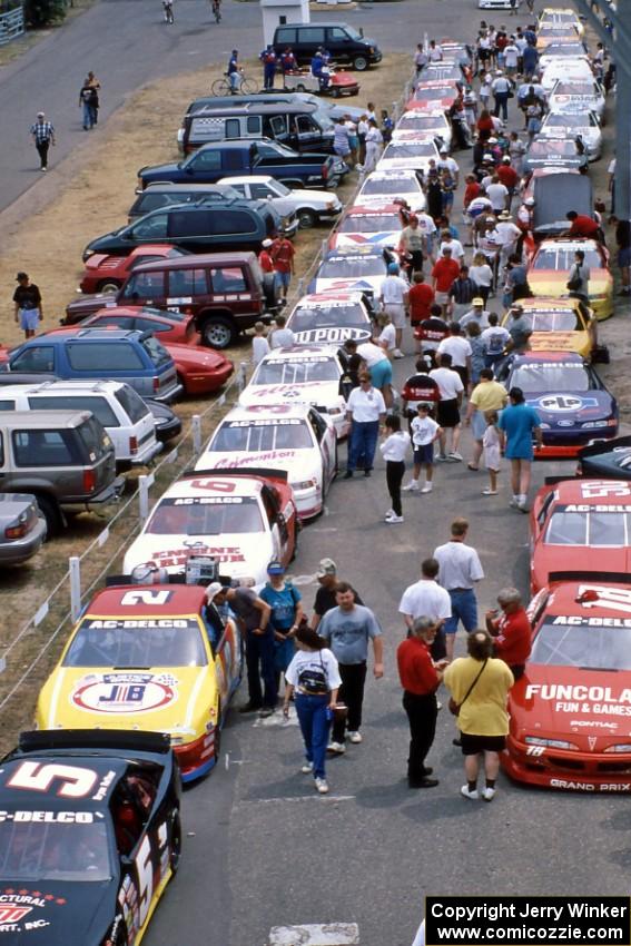 The field lines up on the false grid behind the start tower before the start of the race.