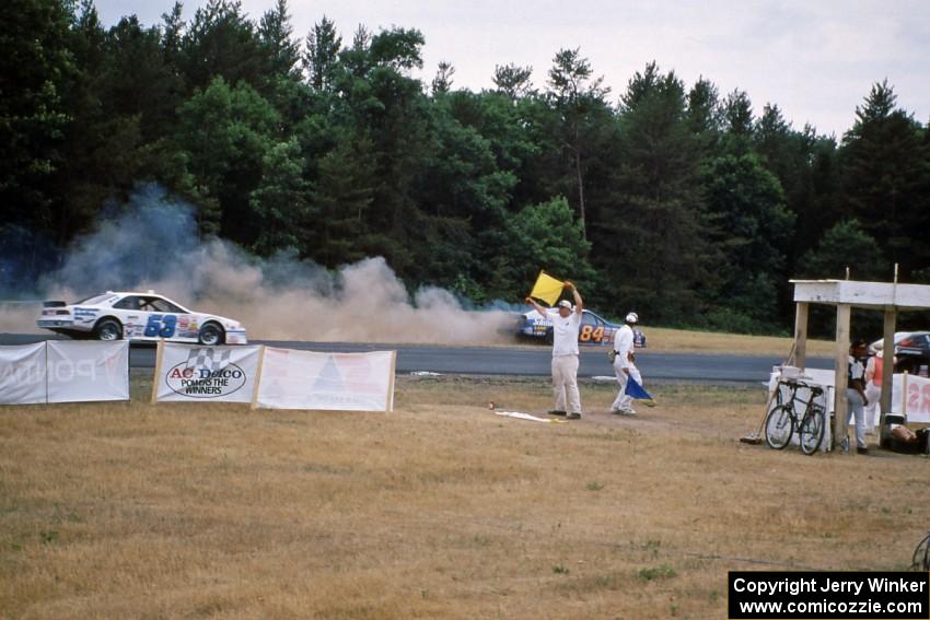 Bob Senneker pops an oil line and catches the engine of his Ford Thunderbird on fire