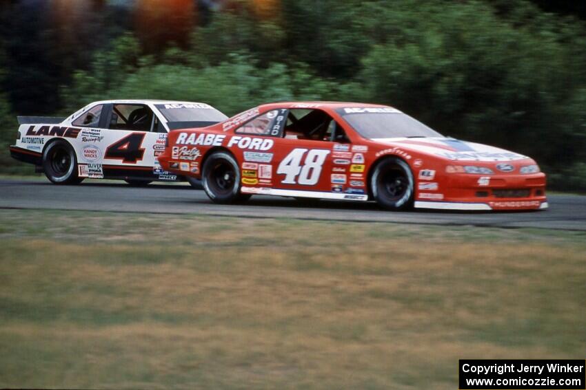 Joe Nott's Ford Thunderbird gets inside Dave Sensiba's Chevy Lumina at turn 3