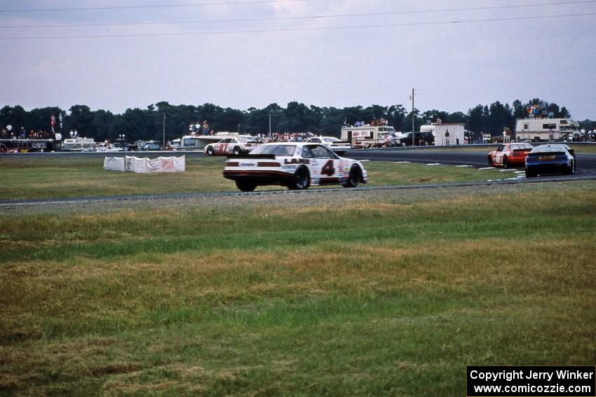 Tony Raines' Pontiac Grand Prix, Mike Miller's Pontiac Grand Prix, ?, Bob Senneker's Ford Thunderbird and Dave Sensiba's Chevy