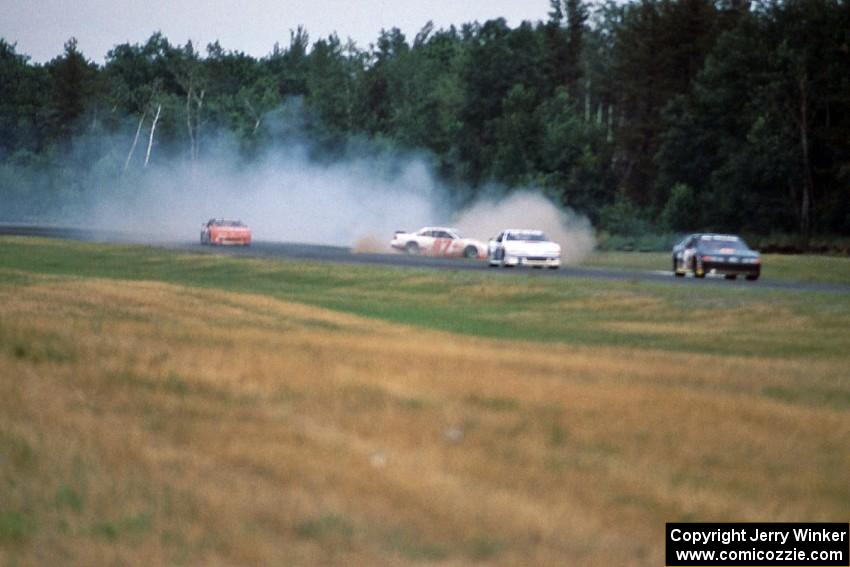 Tony Raines' Pontiac Grand Prix spins coming out of turn 2