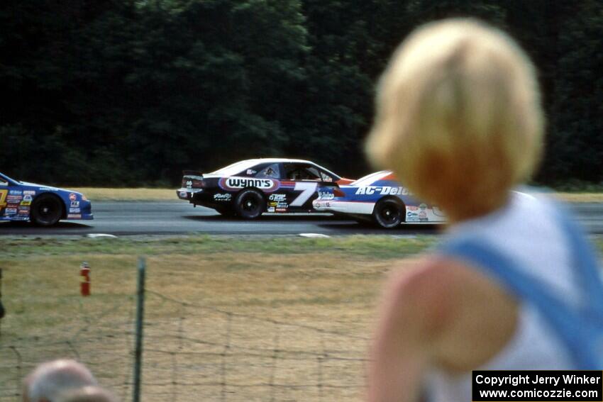 Ken Schrader's Chevy Monte Carlo, Gary St. Amant's Ford Thunderbird and Bob Senneker's Ford Thunderbird