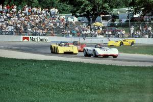 Lola T-163, McLaren M-12, Lola T-163B and McLaren M6-B at corner 5