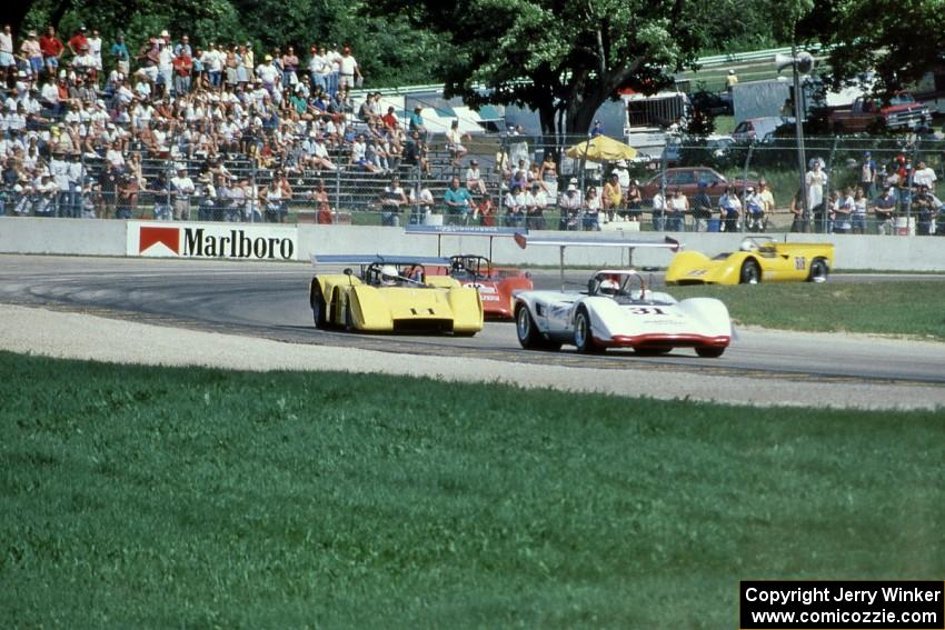Lola T-163, McLaren M-12, Lola T-163B and McLaren M6-B at corner 5