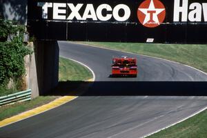 McLaren M6B and McLaren M8F Can-Am cars under the turn 13 bridge.