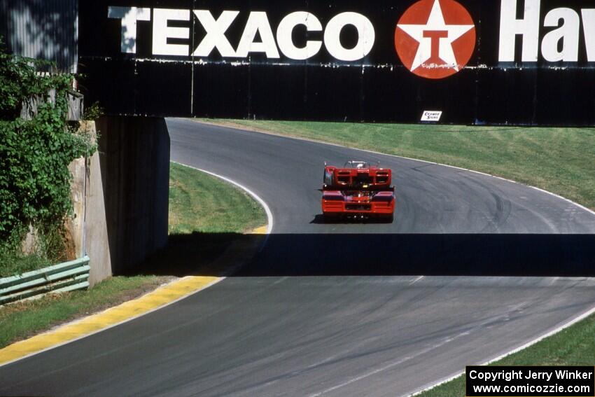 McLaren M6B and McLaren M8F Can-Am cars under the turn 13 bridge.