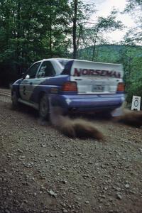 Carl Merrill / Lance Smith Ford Escort Cosworth RS leaves the start of the practice stage.