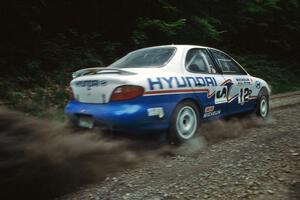 John Buffum / Tom Grimshaw Hyundai Elantra leaves the start line of the practice stage.