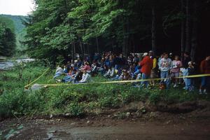 The crowd awaits the start of the creek crossing at the finish of SS1.