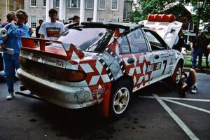 The Henry Joy IV / Michael Fennell Mitsubishi Lancer Evo II gets repaired after rolling early in the day