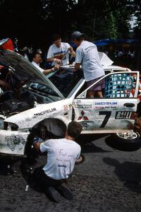 The Henry Joy IV / Michael Fennell Mitsubishi Lancer Evo II gets repaired after rolling early in the day