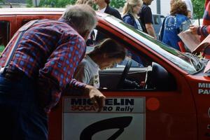 Paula Gibeault goes over notes in the Mike Whitman Ford Sierra Cosworth