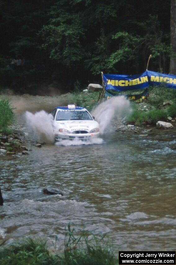 Paul Choinere / Jeff Becker Hyundai Tiburon finishes SS1, Stony Crossing.