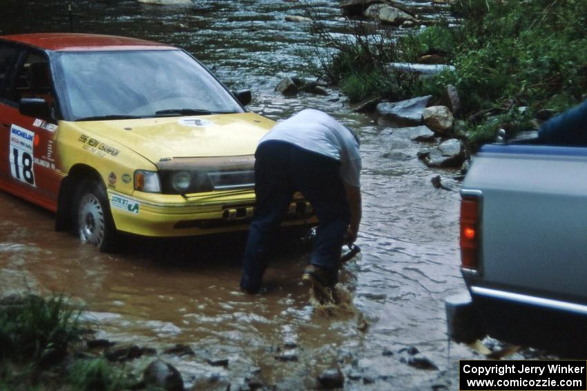 Dean Fry / Don Kennedy Subaru Legacy gets pulled from the creek on SS1, Stony Crossing.