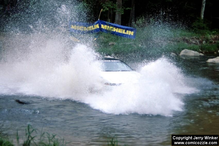 Chris Czyzio / Eric Carlson Mitsubishi Eclipse GSX finishes SS1, Stony Crossing.