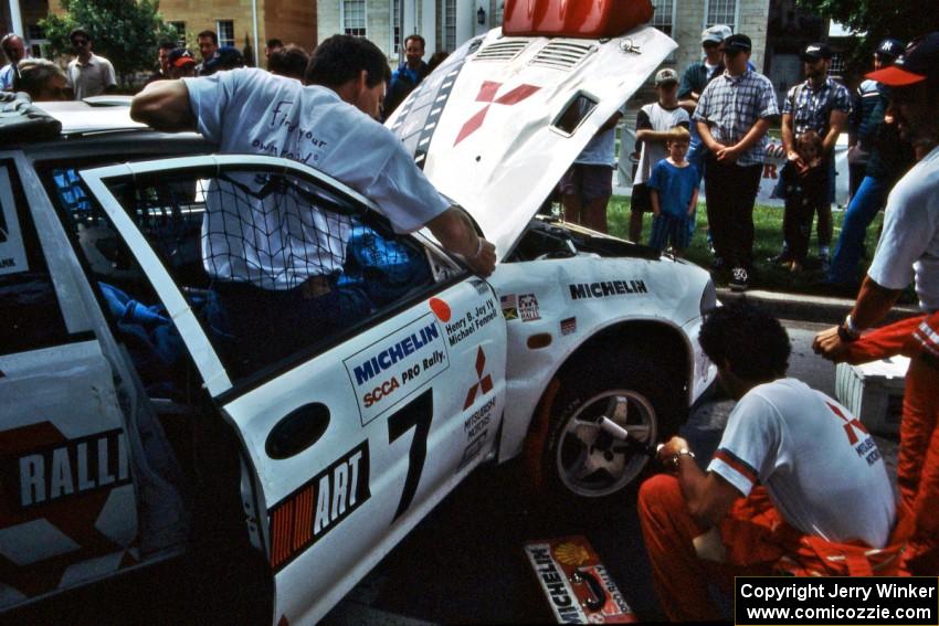 The Henry Joy IV / Michael Fennell Mitsubishi Lancer Evo II gets repaired after rolling early in the day