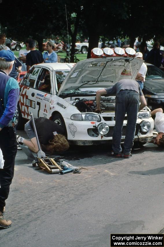 The Henry Joy IV / Michael Fennell Mitsubishi Lancer Evo II gets repaired after rolling early in the day