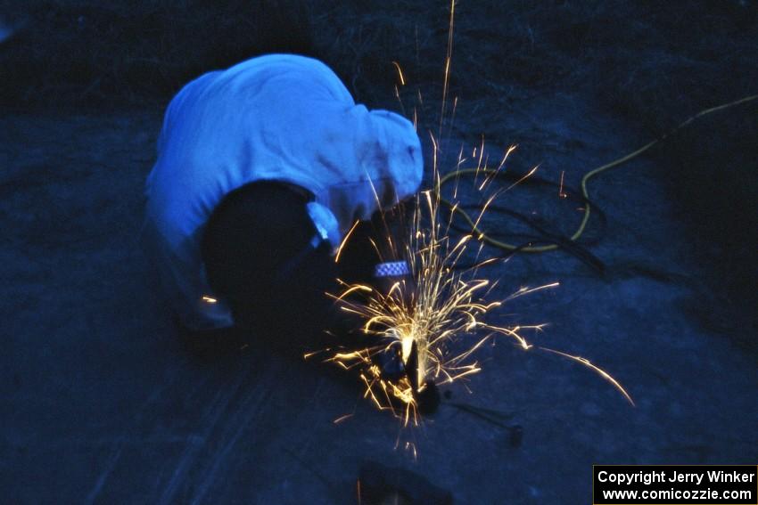 Chris Havas at work on his VW Golf suspension at Germania service