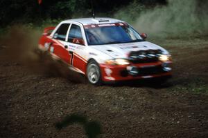 Henry Joy IV / Michael Fennell Mitsubishi Lancer Evo II at the spectator point on SS1, Kabekona.