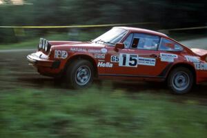 Mike Hurst / Rob Bohn Porsche 911 at the spectator point on SS1, Kabekona.