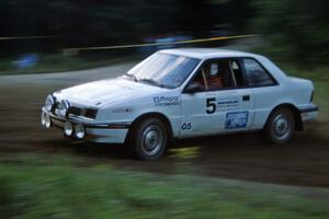 Henry Krolikowski / Cindy Krolikowski Dodge Shadow at the spectator point on SS1, Kabekona.