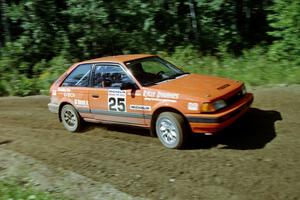 Gail Truess / Pam McGarvey Mazda 323GTX on SS11, Indian Creek.